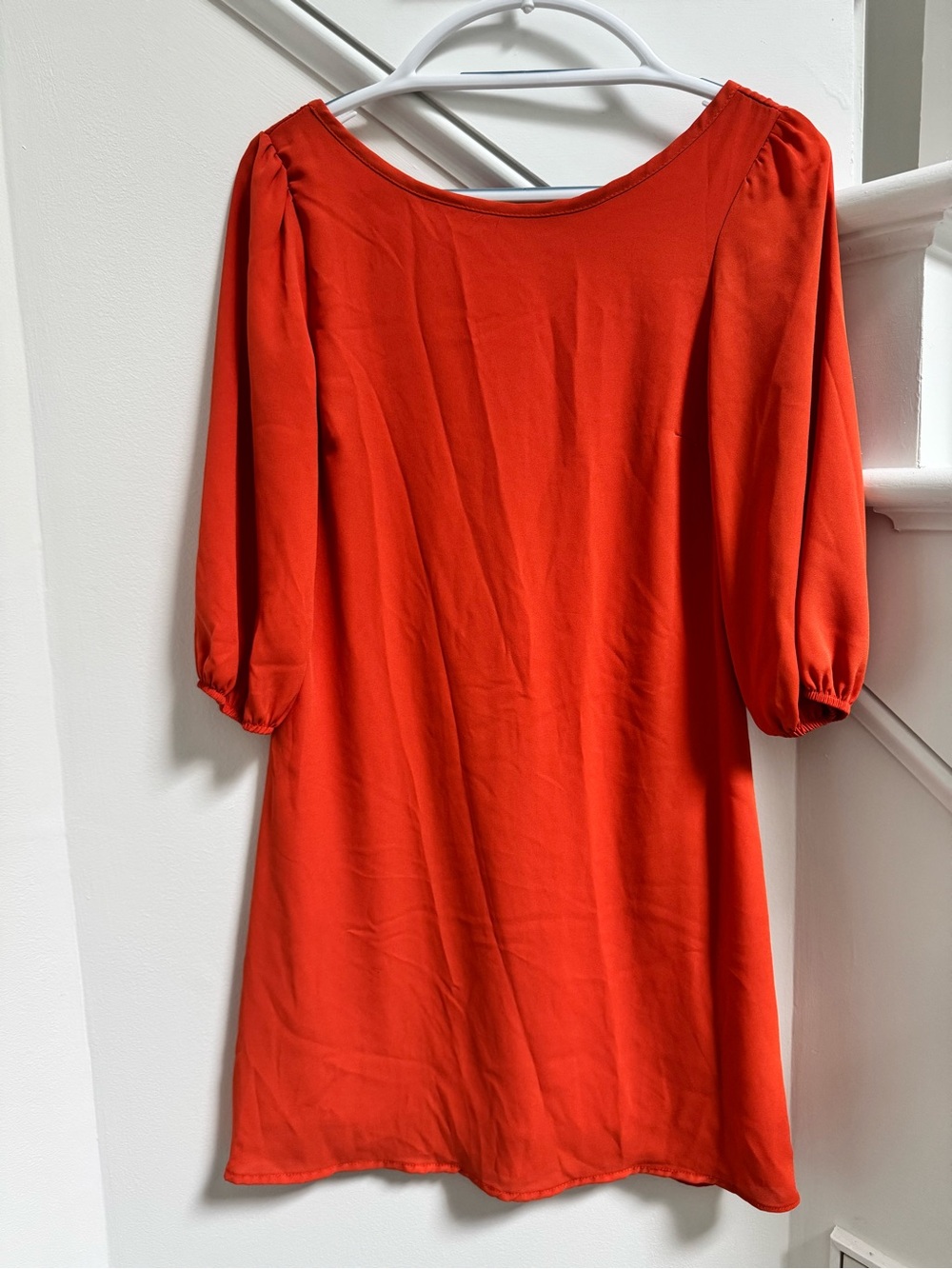 J&M orange dress with white bow back
